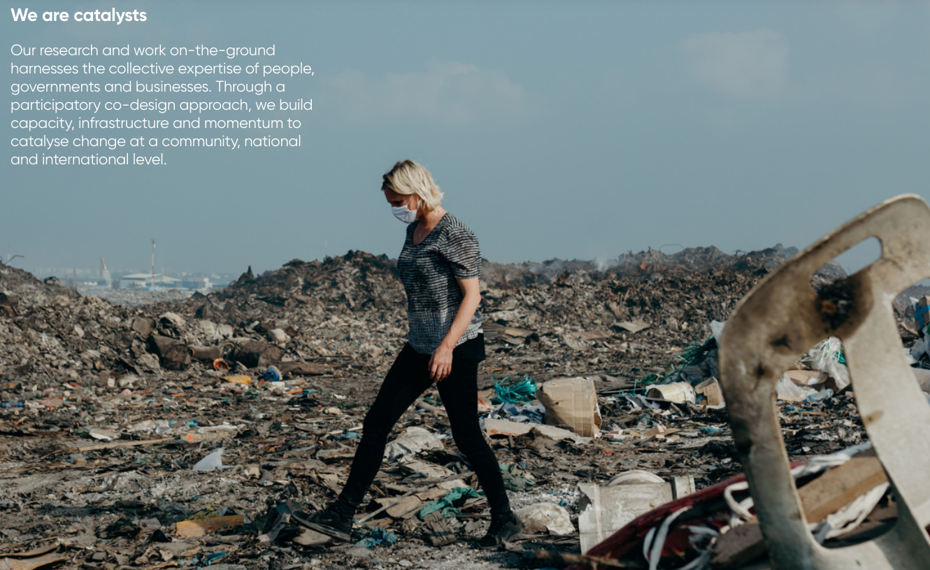 Jo Royle, Managing Director of NGO CommonSeas walks through a waste disposal site.